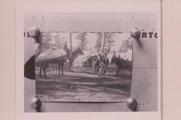 "Queen of the Canyon" on horseback. The skiff used by the USGS in the topographic survey of Grand Canyon National Park
