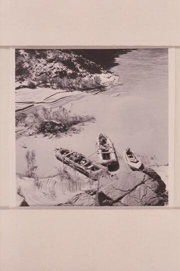 The two boloney boats and the glass outboard boat. Separation Canyon