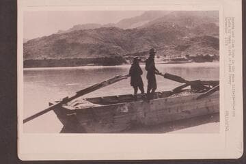 Bessie and Glen Hyde in the scow "Rain-in-the-Face." At Lees Ferry