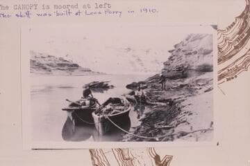 The skiff "W. H. Bradley" at right when moored near Hole in the Rock. The "Canopy" is moored at left. The skiff was built at Lees Ferry in 1910