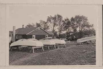 San Juan punts of the Mexican Hat Expeditions at Blanding, Utah. The punt in the foreground has a covering of glass fabric