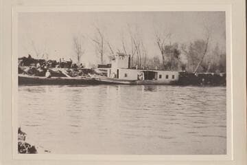 The motorboat "IOLA" operating on the lower river. Tied up at Ehrenberg