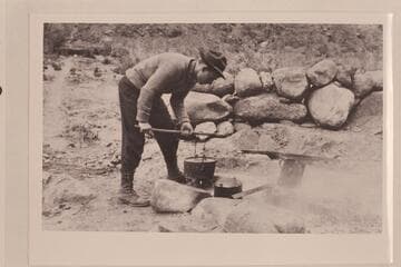 Emery Kolb cooking at Rust Camp on Bright Angel Creek. "Little bit posed" (Dave Rust, Provo, 1955, Sep. 29)