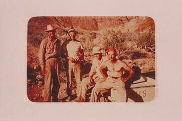 Boatmen of the Nevills San Juan party which left Mexican Hat in 1948, May 19. Nevills wears the red hat, Ben Hess, George Wing and Frank Wright