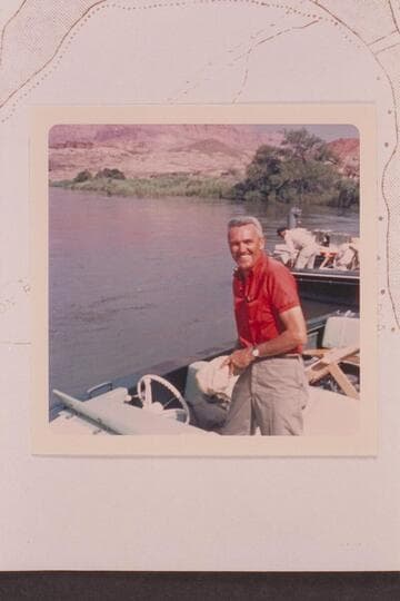 Bob Littleton during preparation for departure from Lees Ferry. Jim Jordan in the background