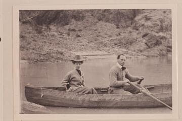 Ellsworth's first boating experience. Posed at the oars of one of Dave Rust's folding canvas boats near Bright Angel Creek while the young lady tried to look calm and collected